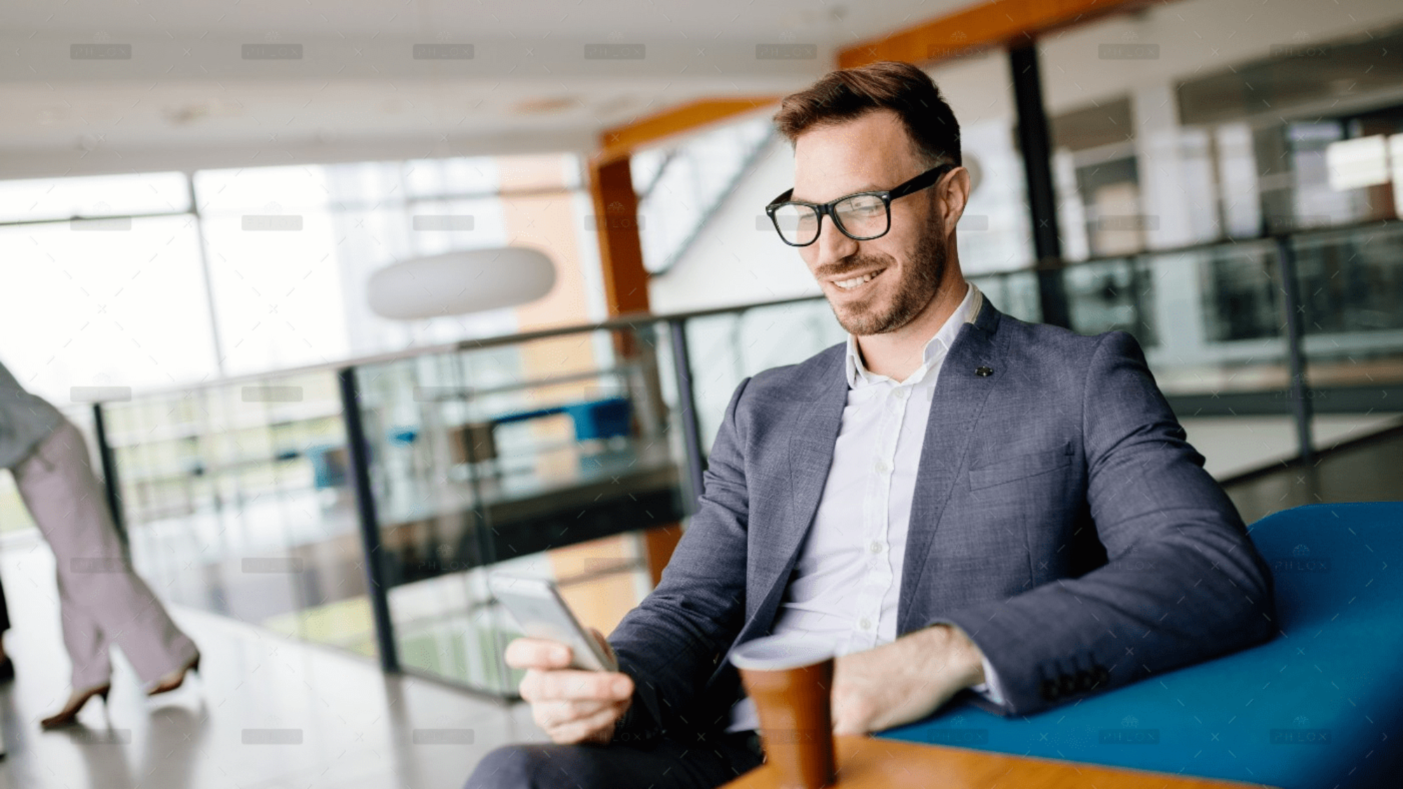 demo-attachment-1775-businessman-taking-a-break-with-a-cup-of-coffee-JW4B3DH